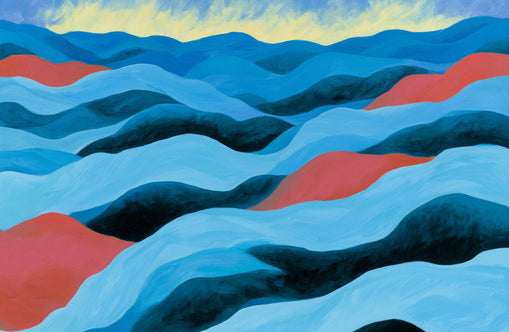 Blue hills under pale sky