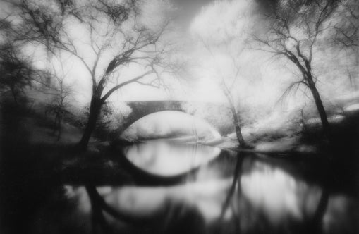 Bridge in a washed sky