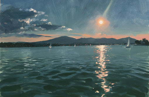Peach sun on blue water