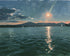 Peach sun on blue water