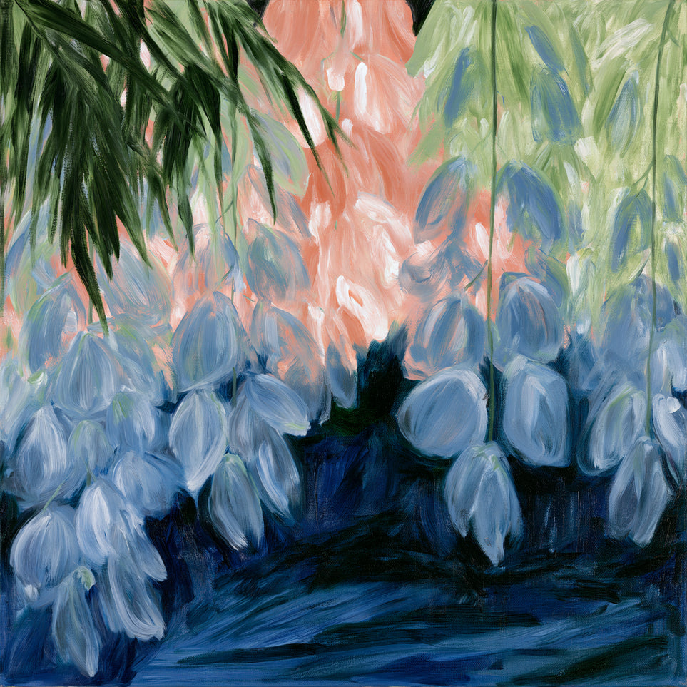 Blue flowers under green leaves