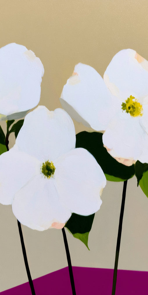 Three white flowers above purple