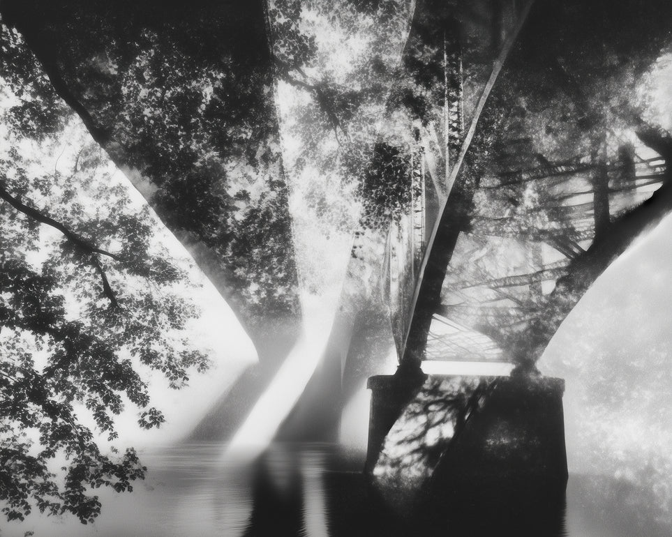 Steel Bridge Over a Slow River in Sunlight