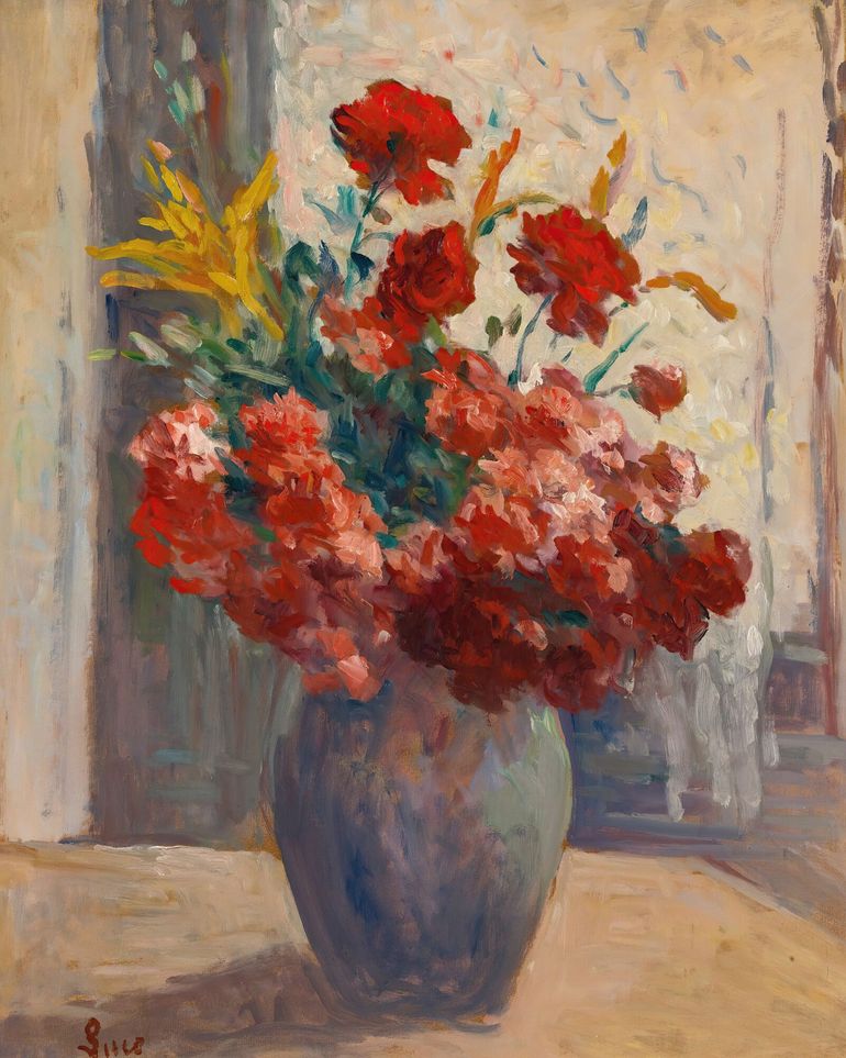 Flowers within a tall vase