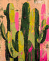 Cacti among pink splatters