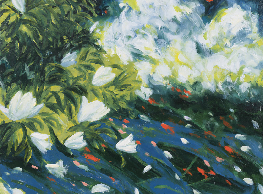 White petals on blue water