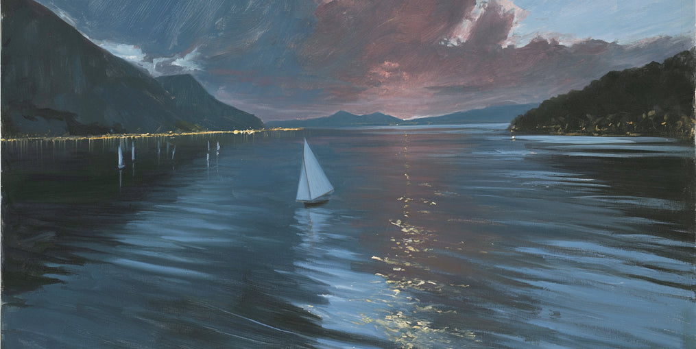 A sailboat beneath storm clouds