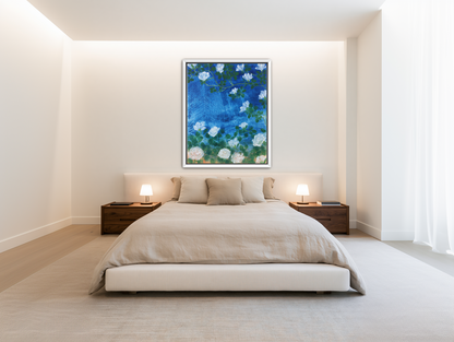 White blossoms on cobalt blue room view